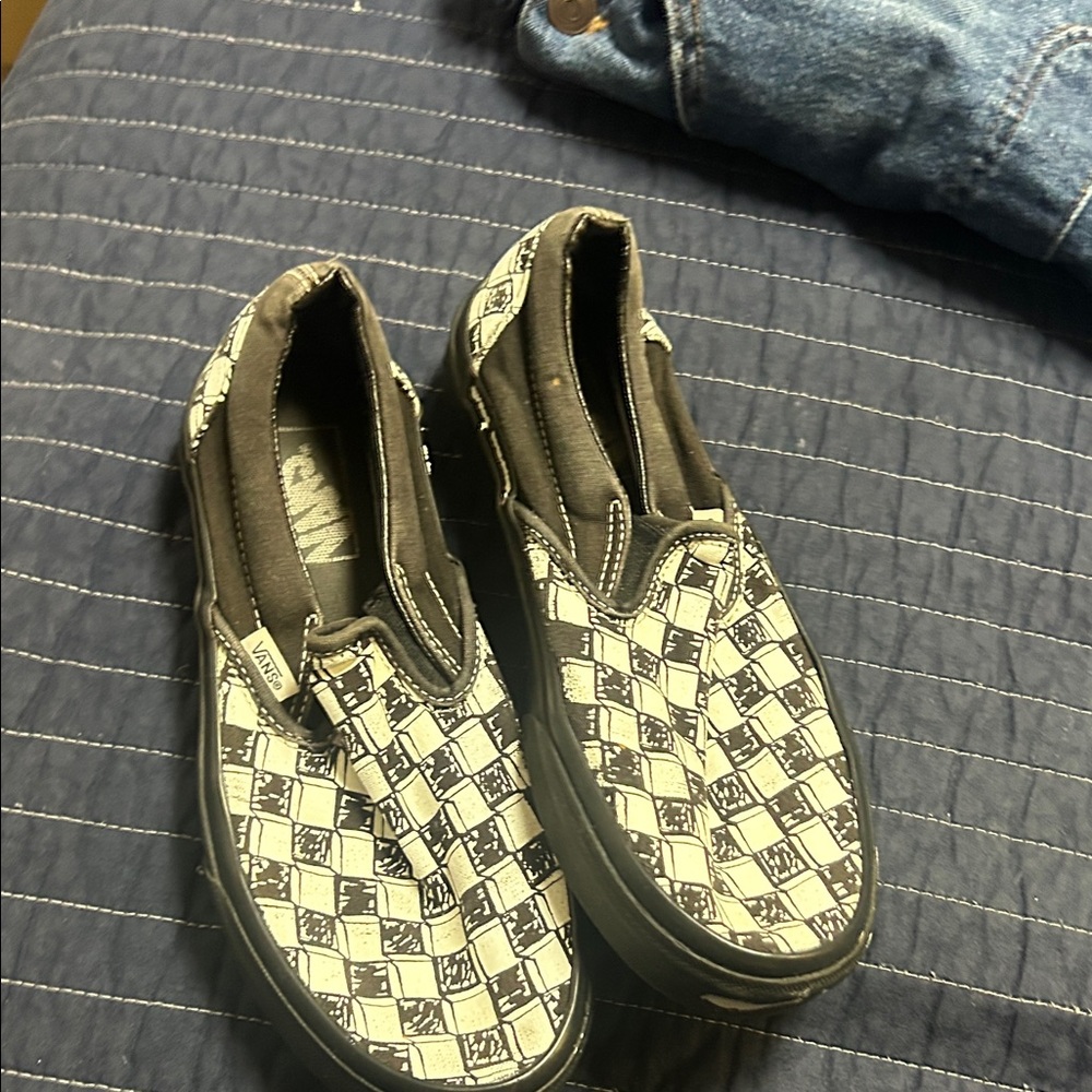 Vans Black and White Checkered Slip-On Sneakers